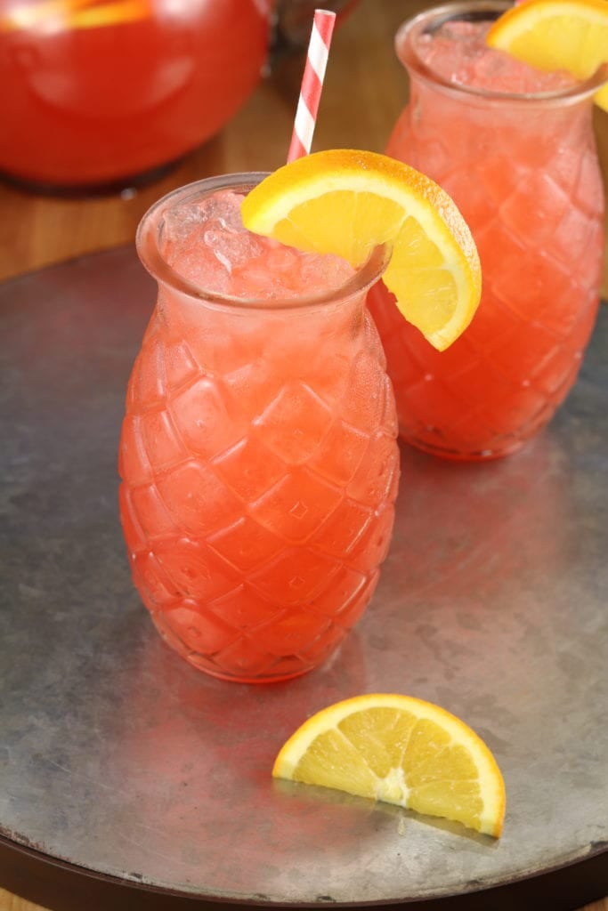 Vodka Party Punch garnished with an orange slice