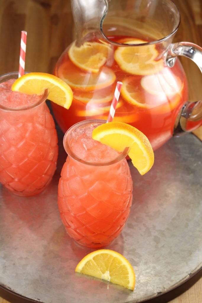Pineapple glasses with Vodka Party Punch on a platter