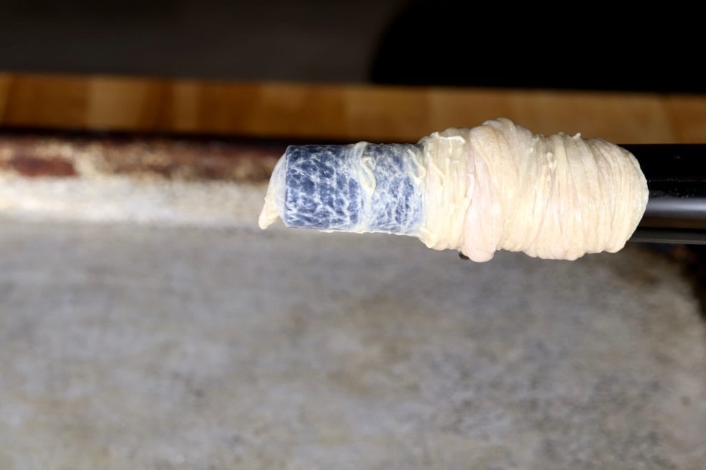 pork casing on a sausage stuffer
