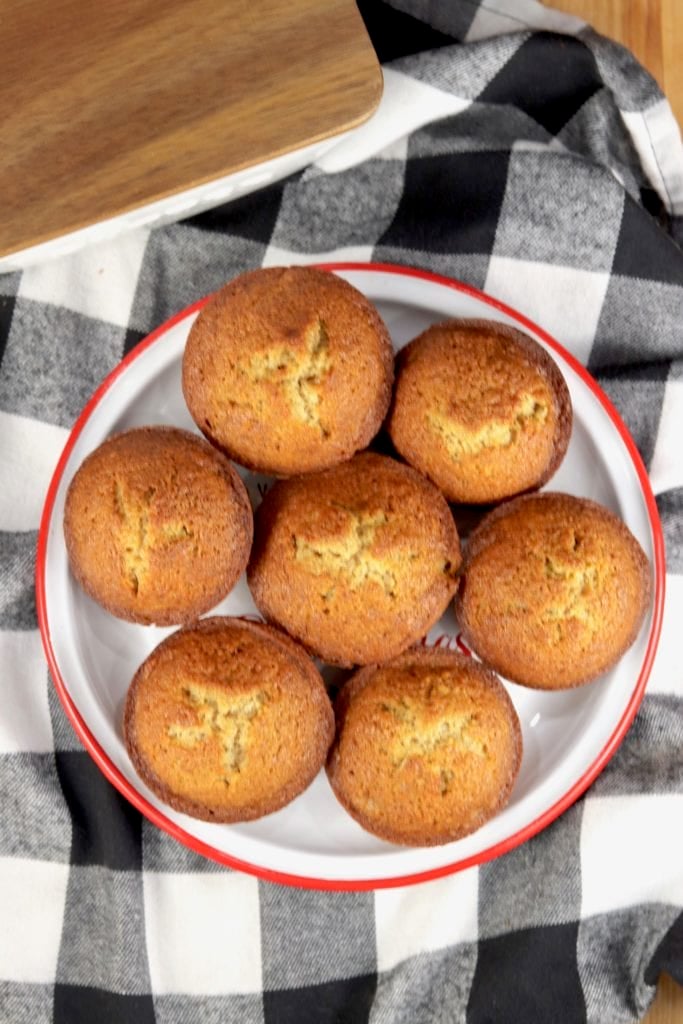 Plate of banana muffins on a black and white checked napkin