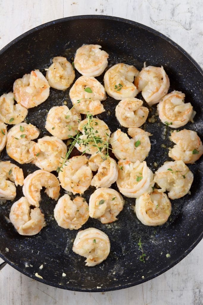 Garlic butter shrimp in a skillet