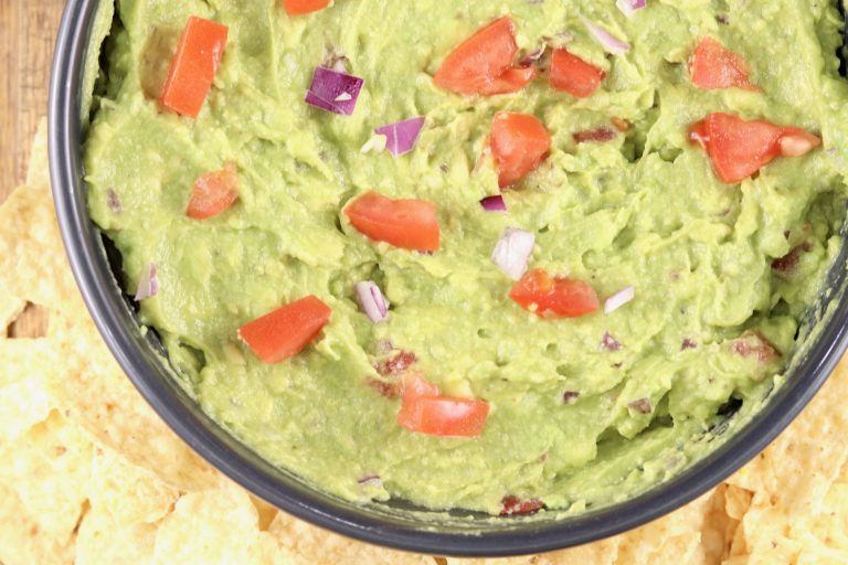 Guacamole dip with tomatoes