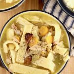 chicken noodle soup bowl with carrots