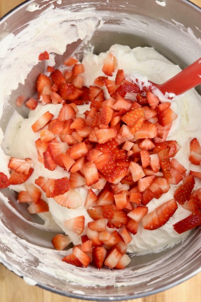 diced strawberries mixed into cream cheese mixture for no bake cheesecake
