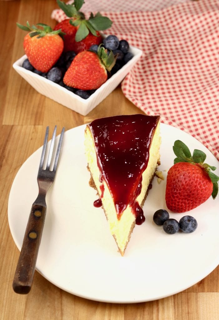 Slice of cheesecake on a white plate