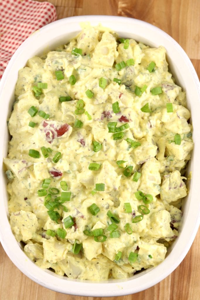 White bowl with potato salad