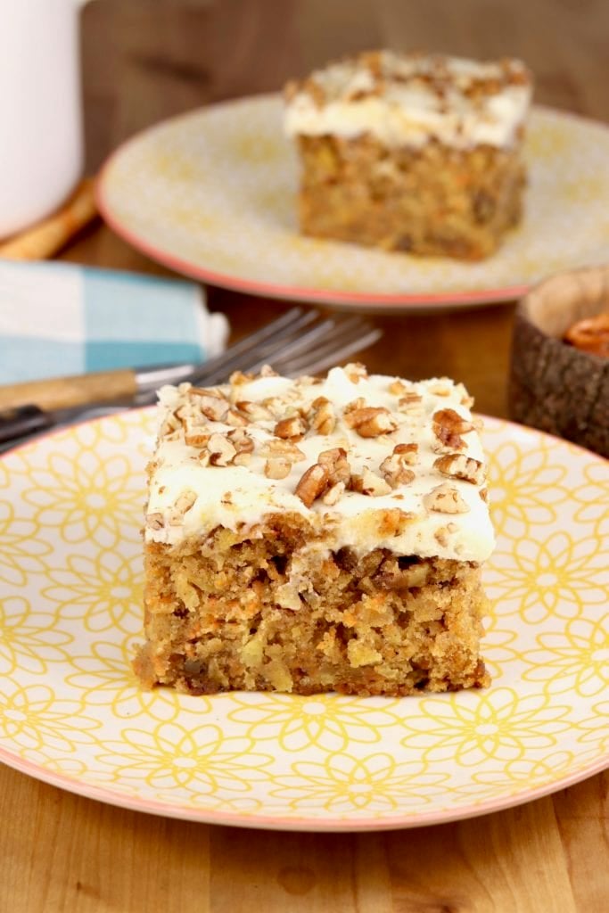 Easy Carrot Cake slice with cream cheese icing and pecans