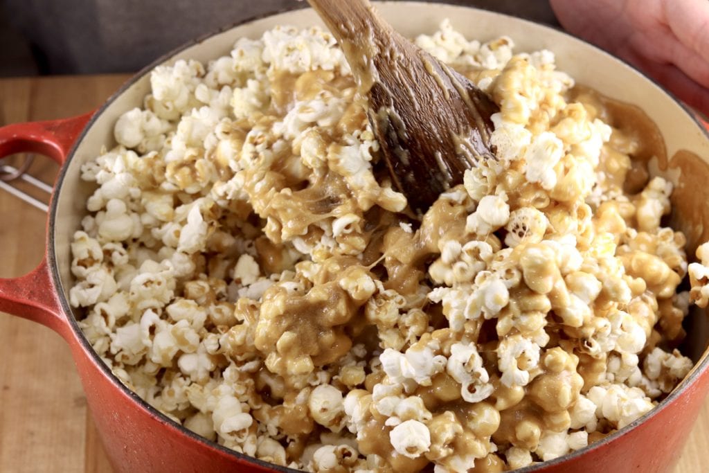 Making caramel popcorn with homemade caramel sauce