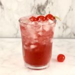 Woo-Woo Cocktail garnished with cherries