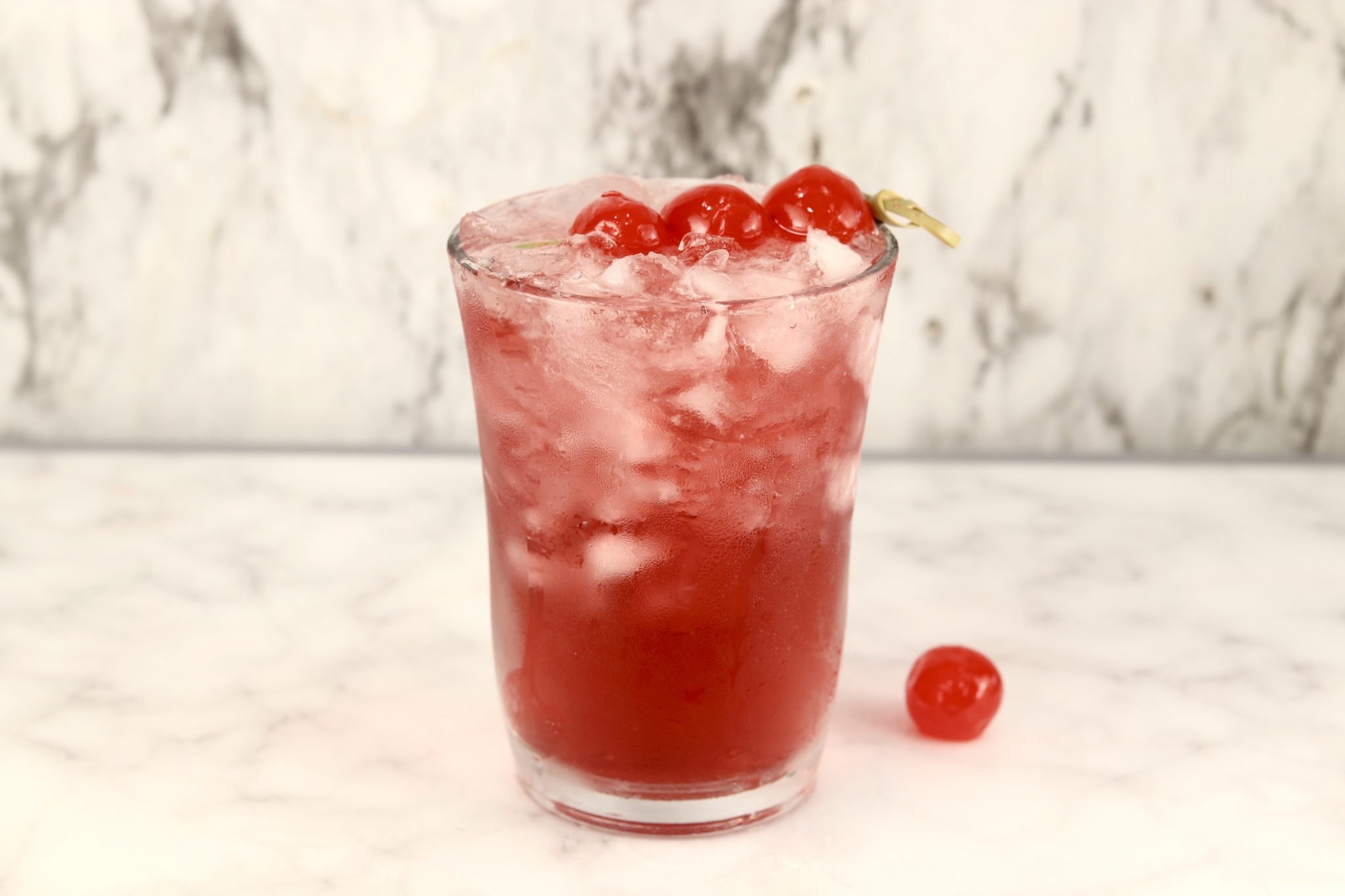 Woo-Woo Cocktail garnished with cherries