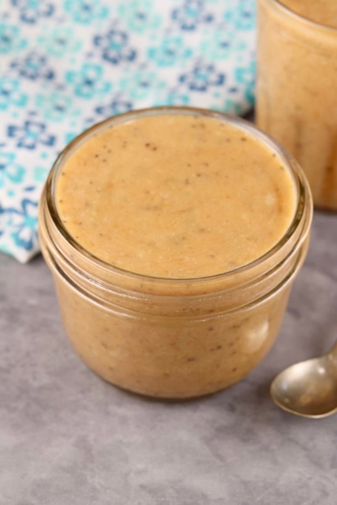 Burger Sauce in a small mason jar with a patterned napkin behind