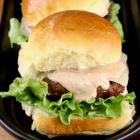 Cheeseburger sliders with burger sauce.