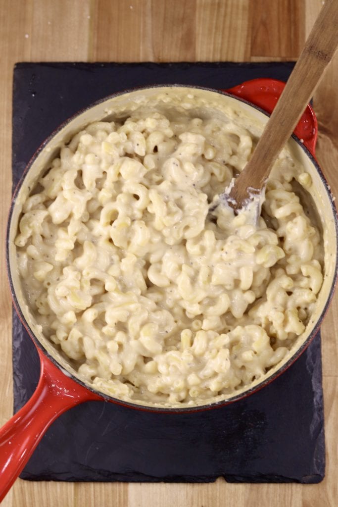 Pan of mac and cheese, wood spoon
