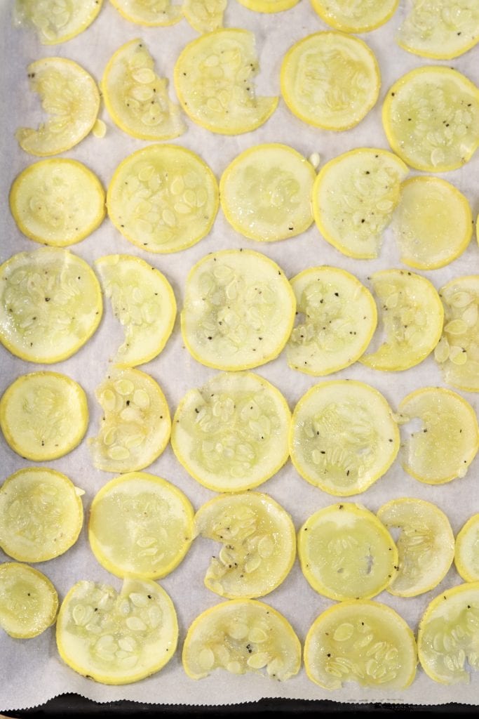 Sliced squash on a baking sheet