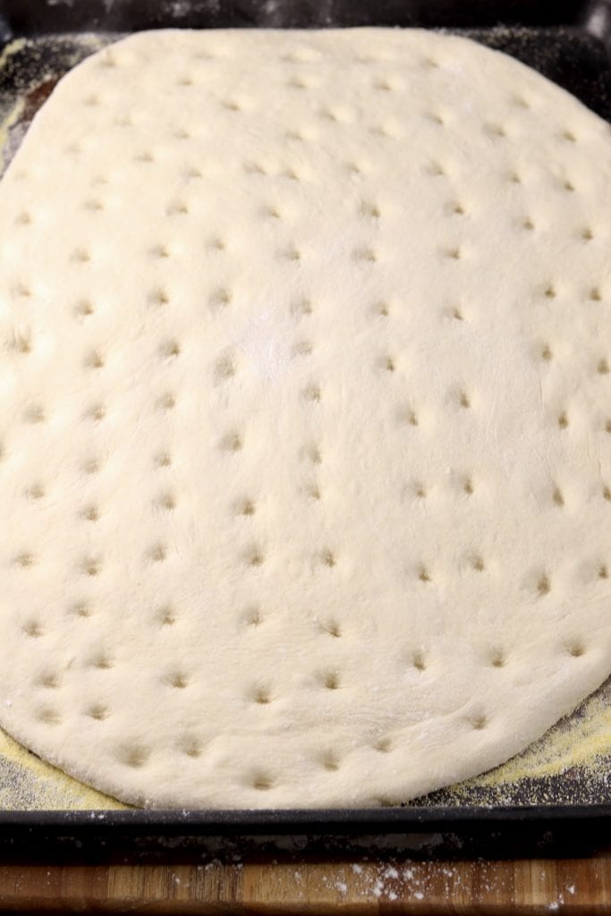 Making Focaccia Bread Dough with indentions