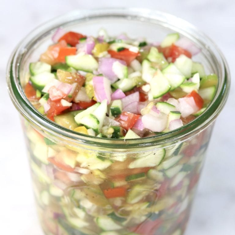 Jar of cucumber tomato salad