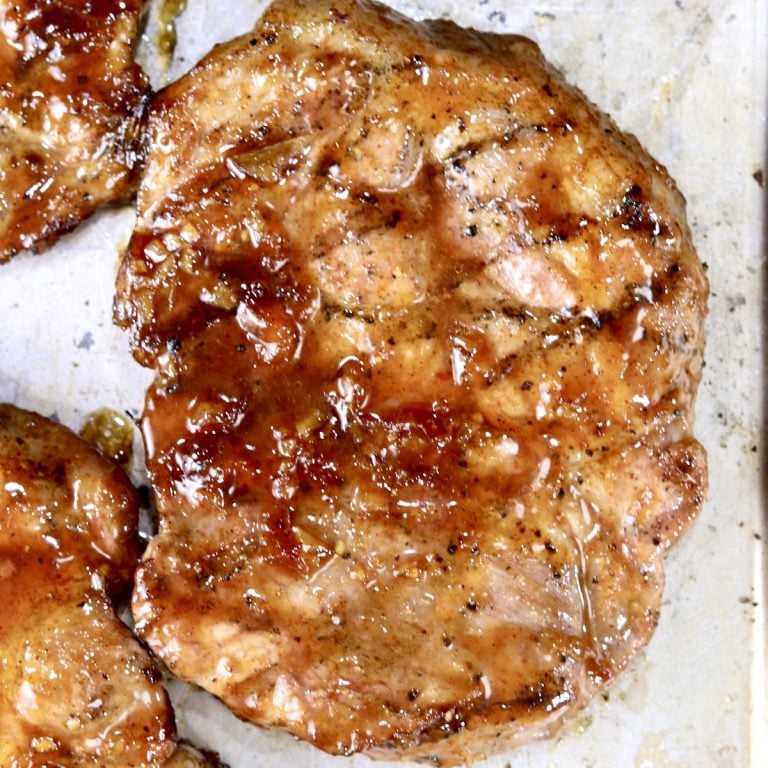 Peach BBQ Pork Steak close up with grill marks
