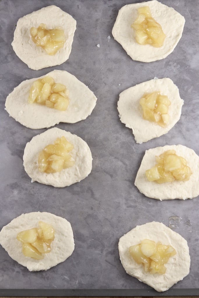 filling biscuit dough with apple pie filling