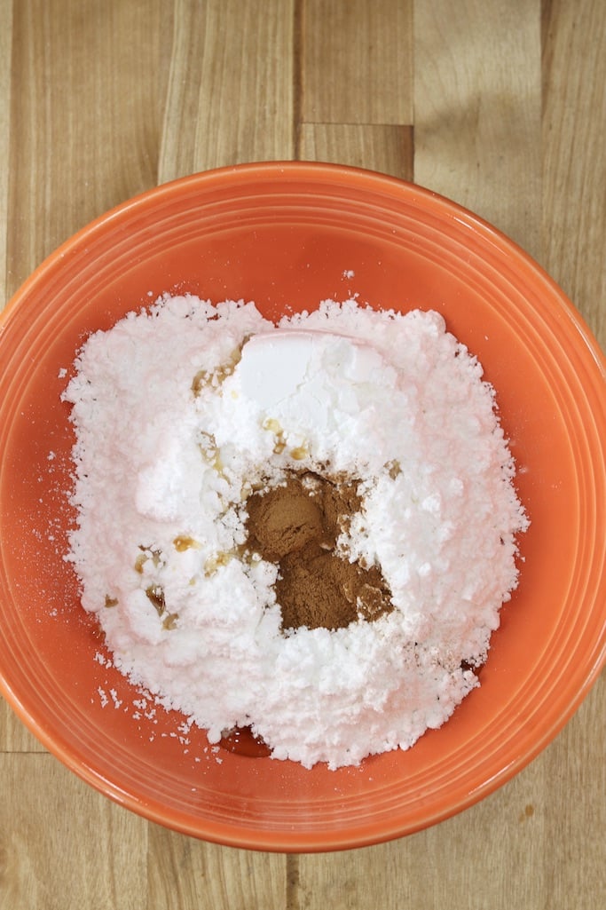 Orange Bowl with powdered sugar and cinnamon for donut glaze