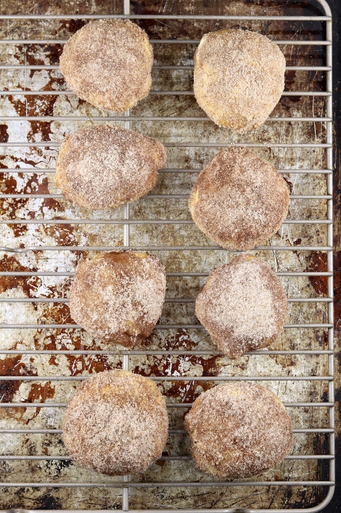 8 Churro apple pie bombs on a wire rack