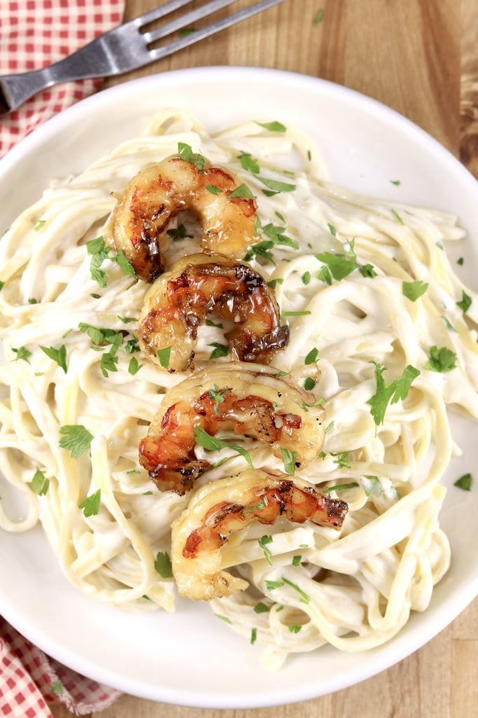 Shrimp Alfredo on a plate overhead view