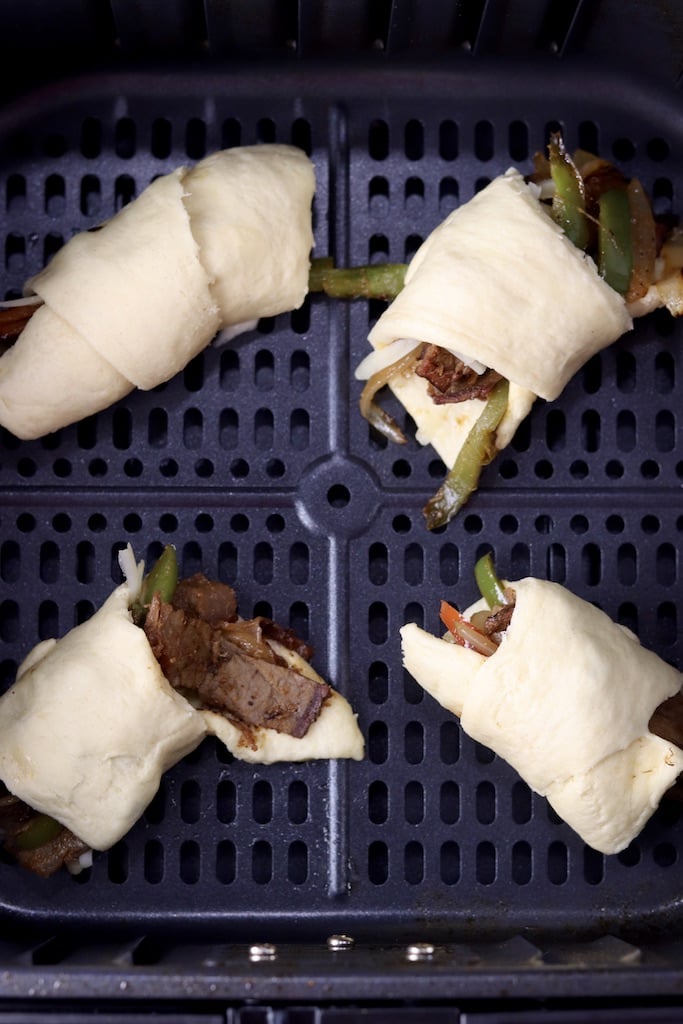 Crescent cheesesteaks in air fryer basket