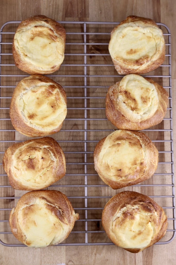 wire rack filled with 8 cheese danishes
