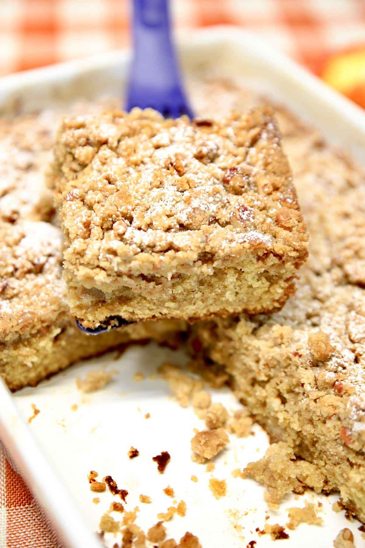 Apple Streusel coffee cake on a spatula.