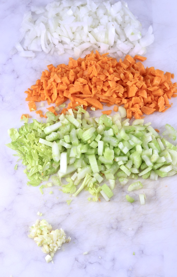 Chopped onions, carrots, celery, garlic for chicken pot pie soup