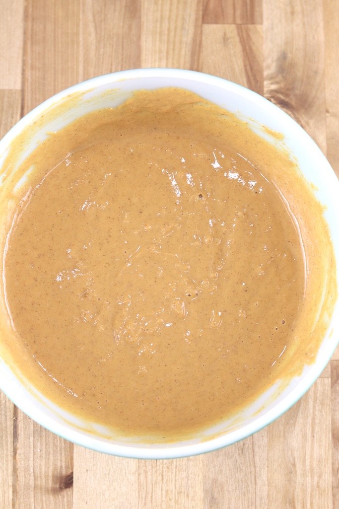 Pumpkin pie filling mixed together in a bowl