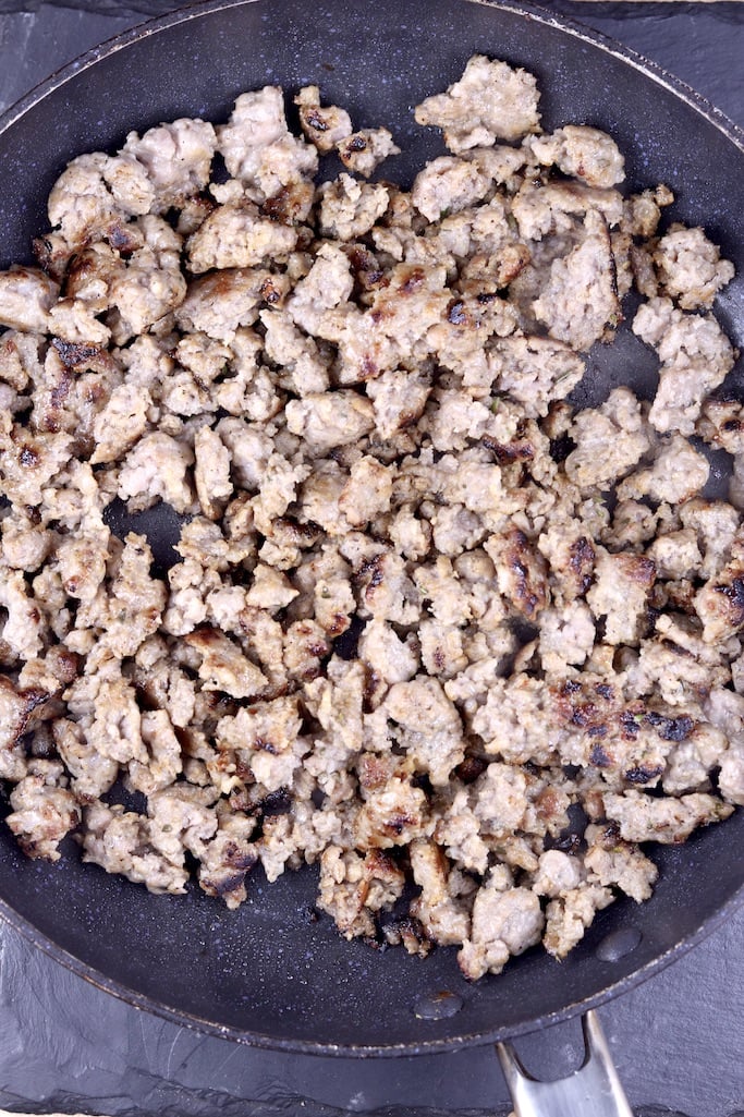 cooked and crumbled sausage in a skillet