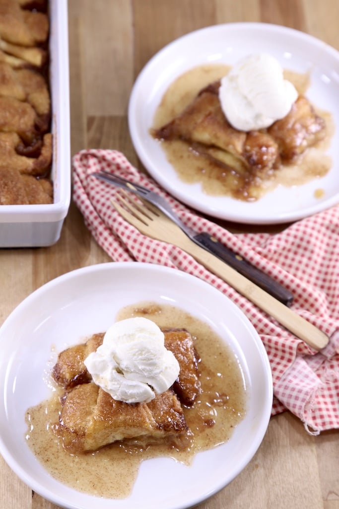 2 plates of apple dumplings with vanilla ice cream