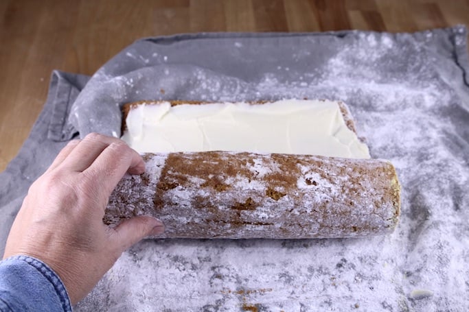 Rolling cream cheese filled pumpkin cake