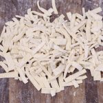 Pasta dough cut into small strips