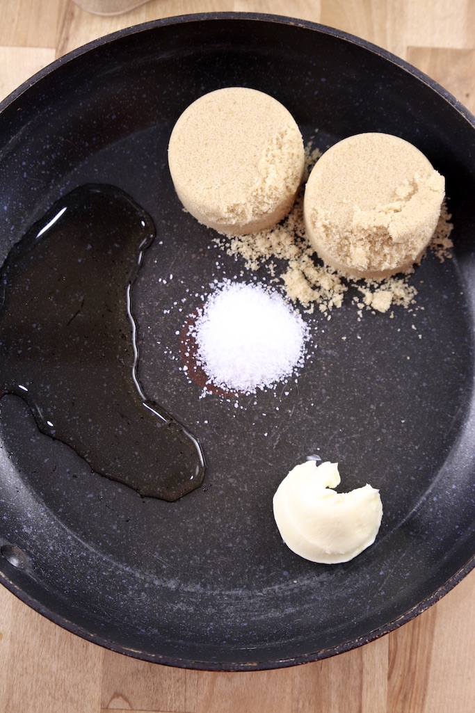 skillet with water, brown sugar, salt and butter for making candied nuts