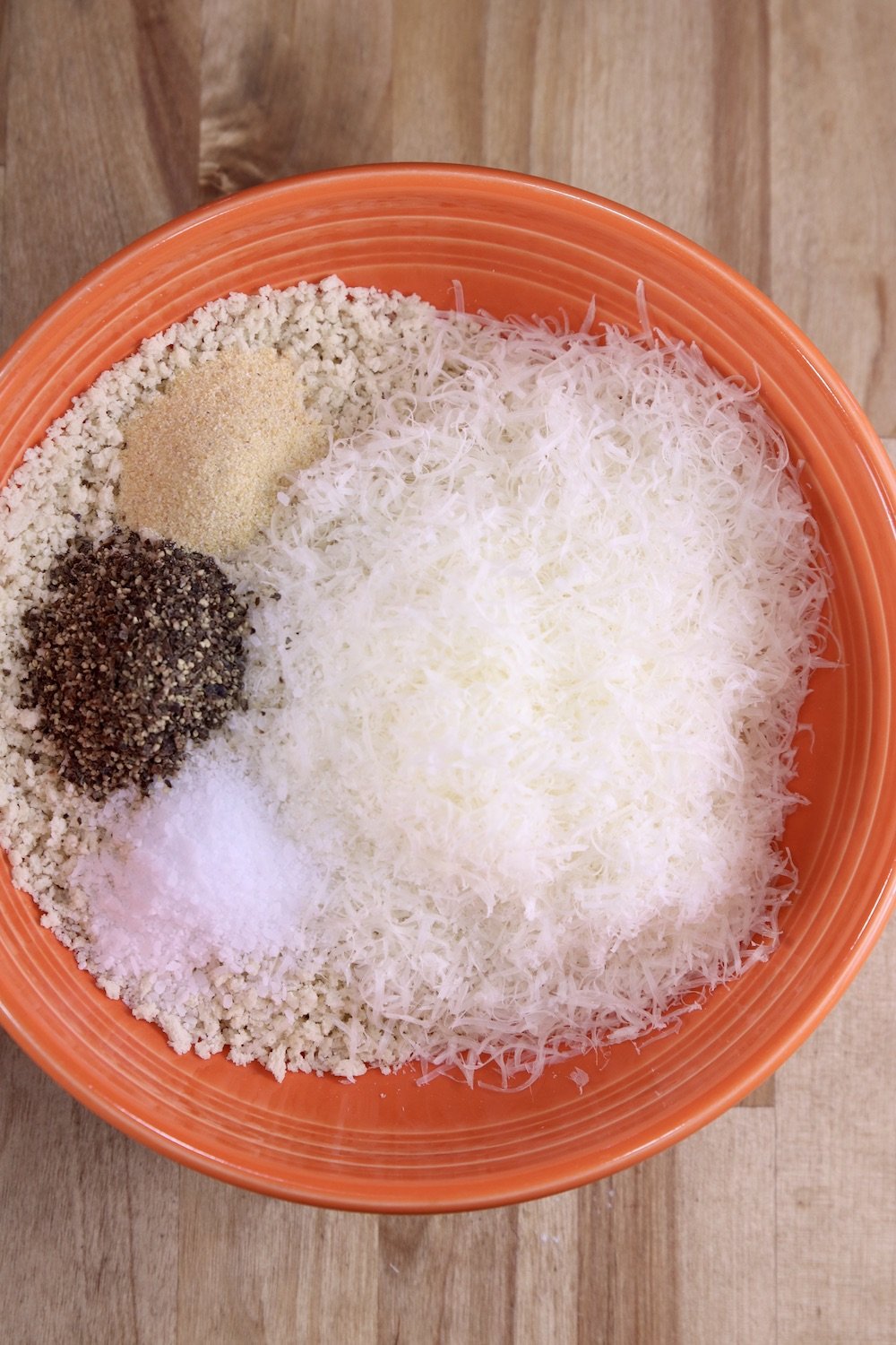 bowl with panko, parmesam cheese, salt, pepper and garlic