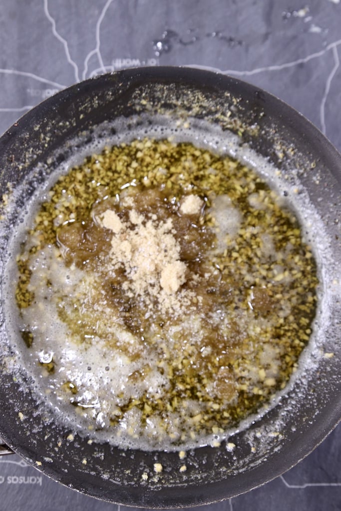 Garlic butter with brown sugar in a skillet