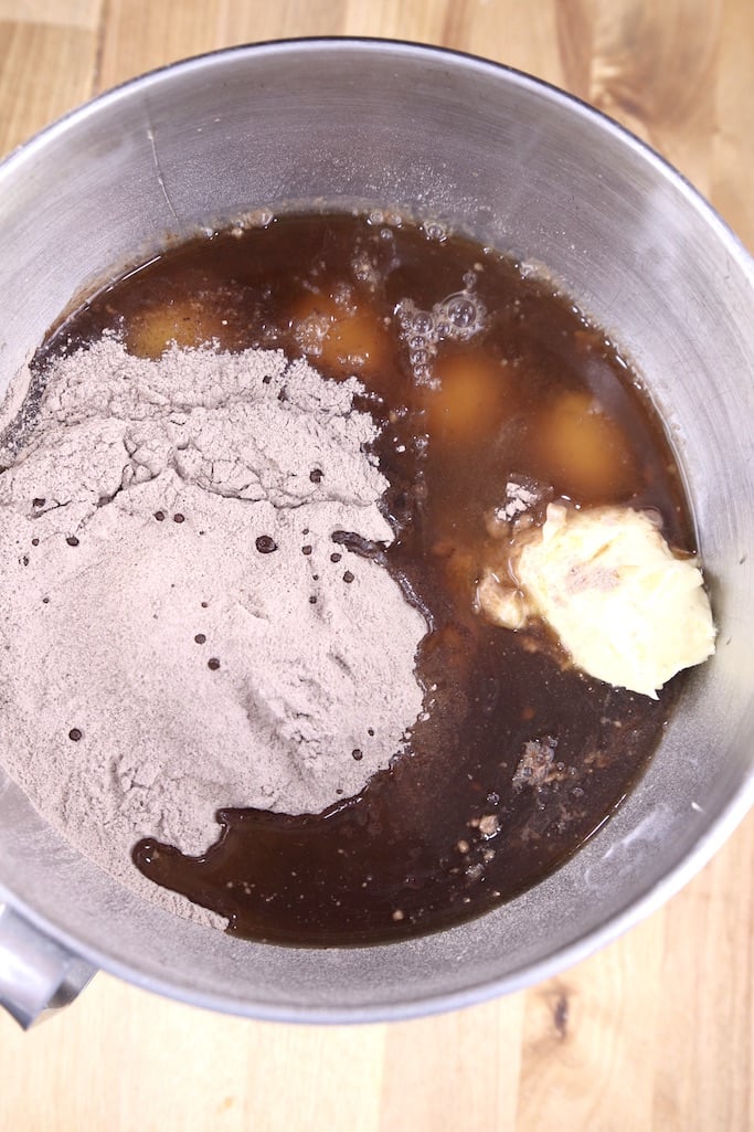 mixer bowl with cake mix, eggs, rum and butter