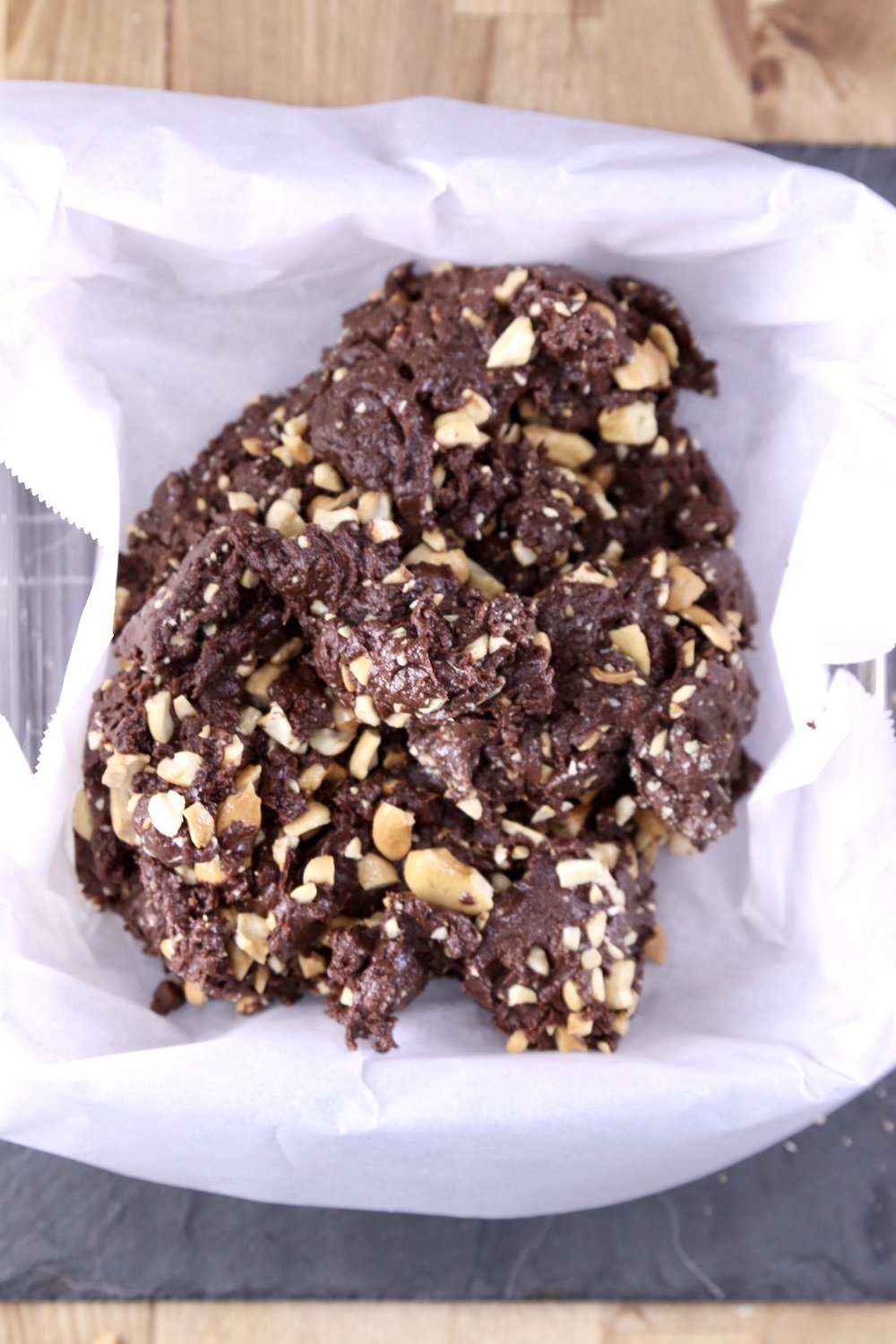 Parchment lined pan with cashew fudge