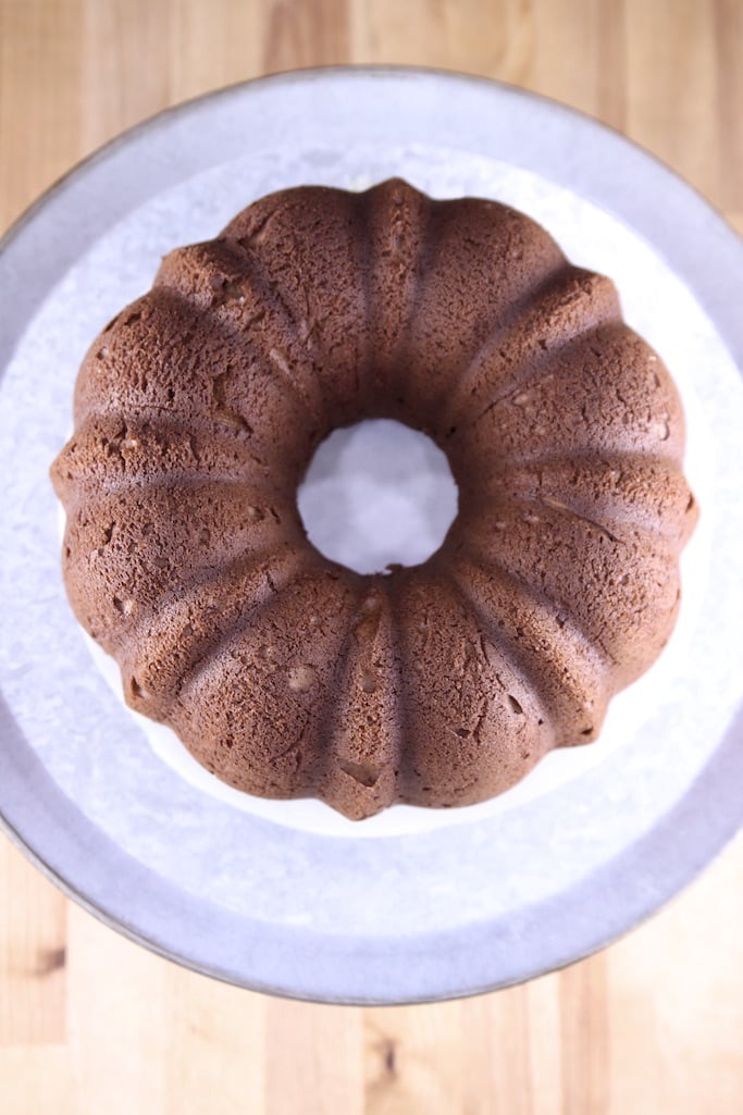 Chocolate bundt cake inverted onto serving plate