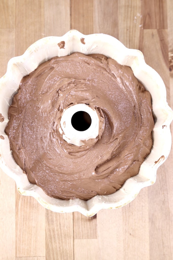 chocolate cake batter in a bundt cake pan
