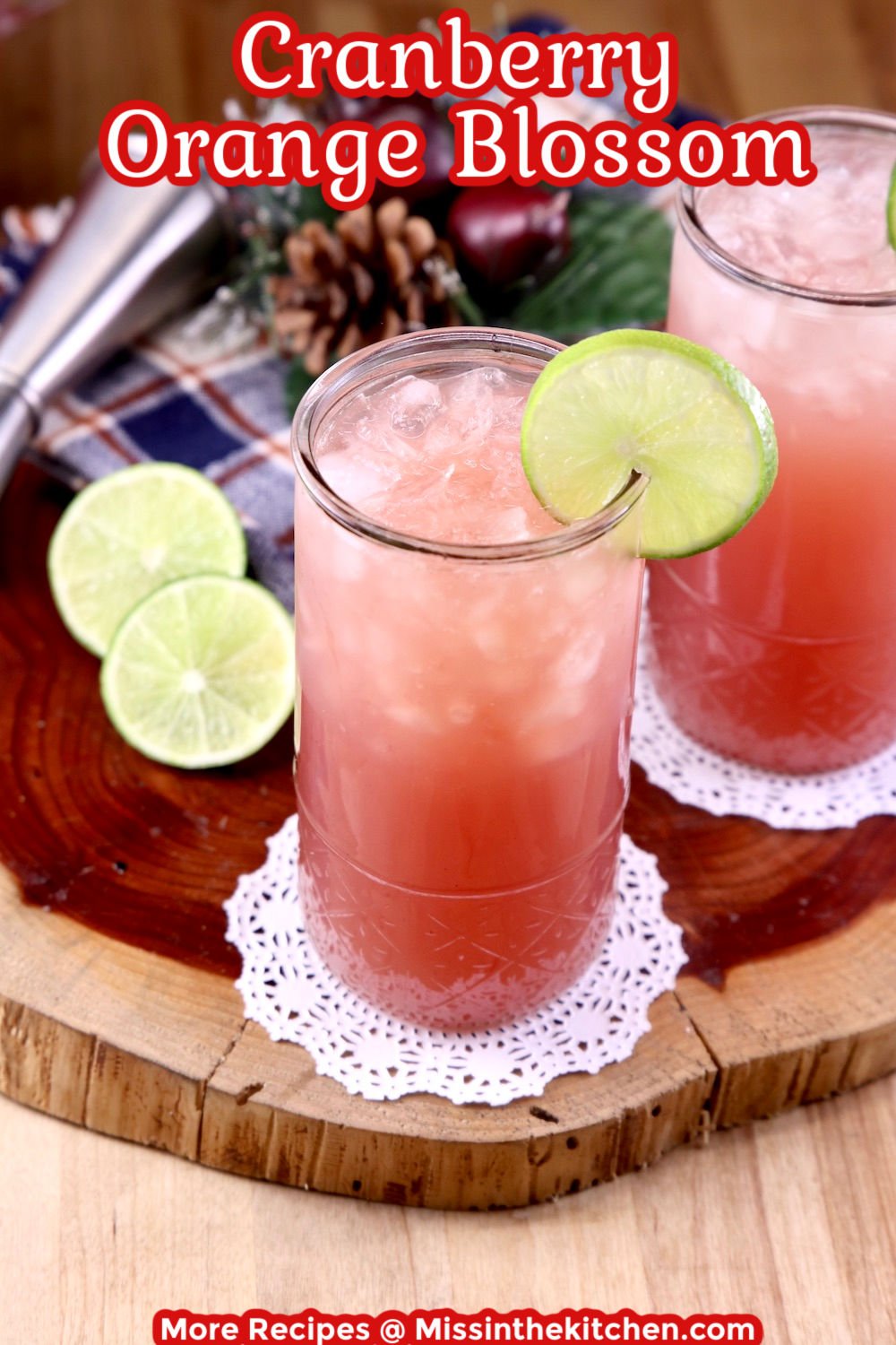 Cranberry Orange Blossom Cocktails with lime garnish - text overlay