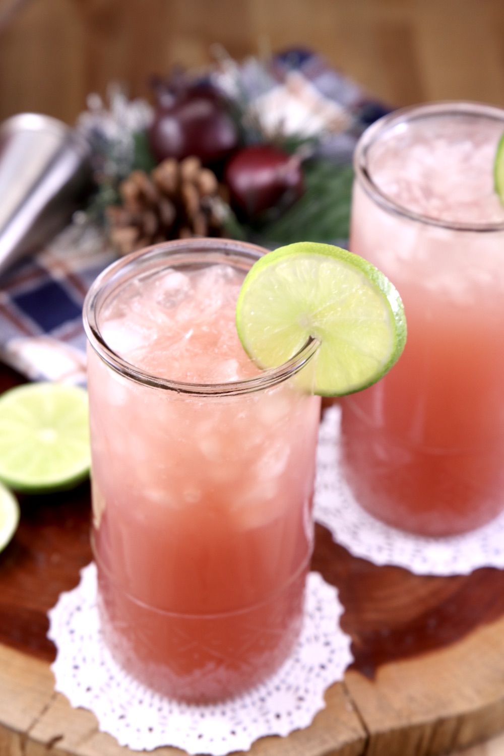 Cranberry Orange Cocktail with lime garnish made with gin