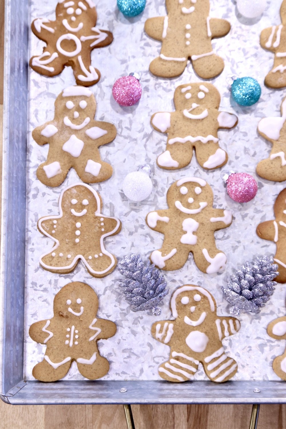Gingerbread Men Cookies decorated on a tay with Christmas Ornaments
