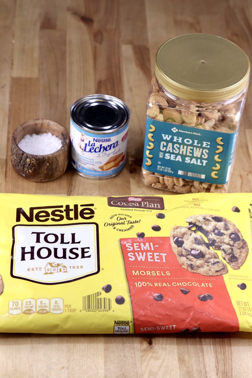 bag of chocolate chips, cashews, sweetened condensed milk, flake salt 