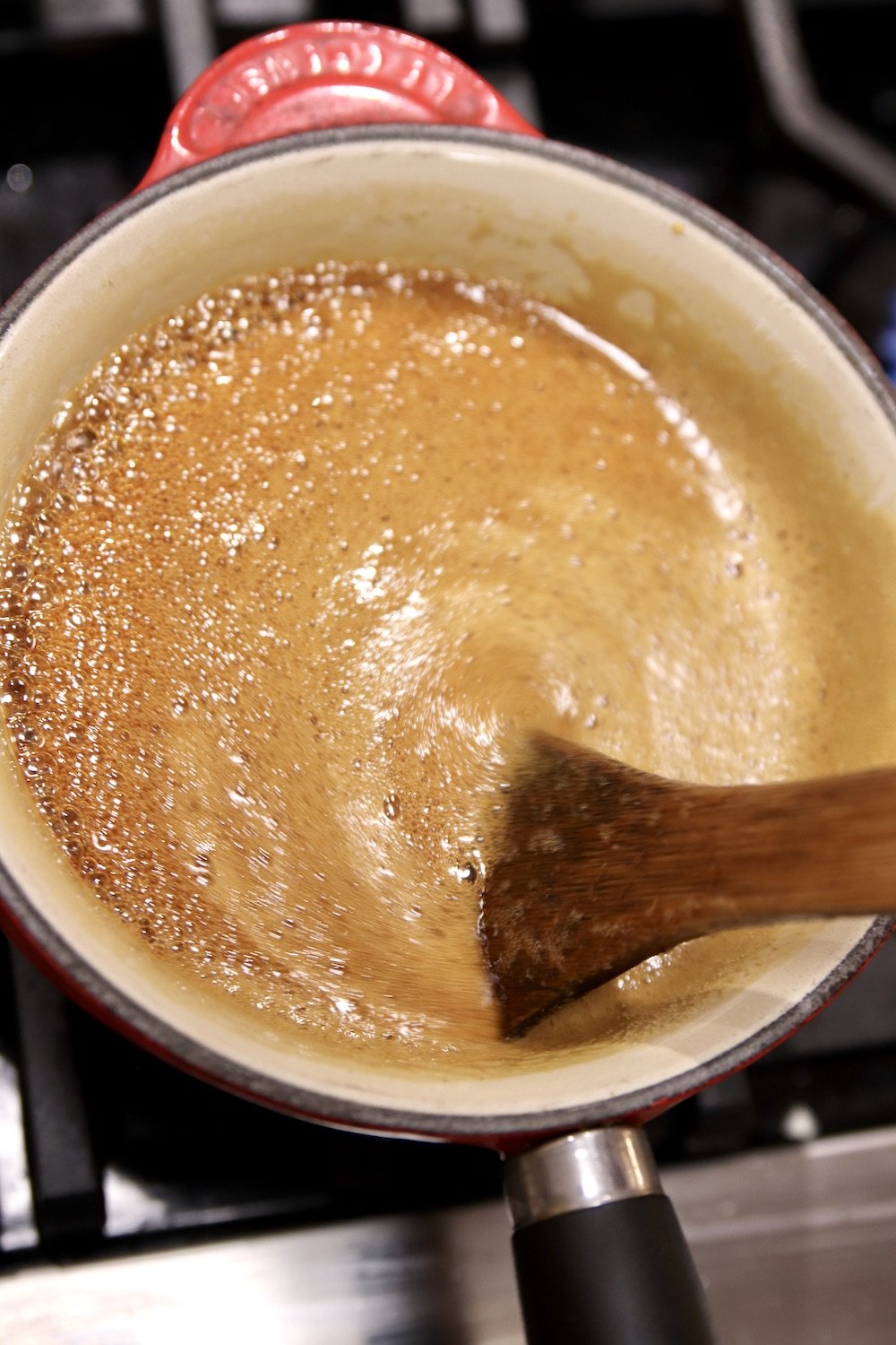 Boiling cane syrup to hard ball stage