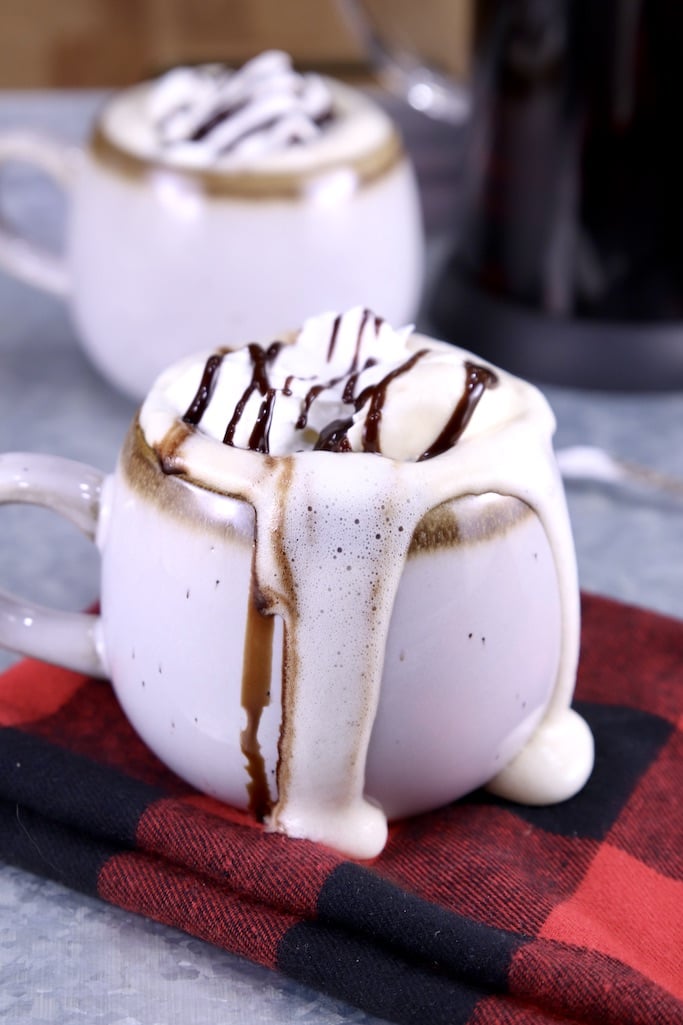 2 mugs with mudslide coffee, overflowing