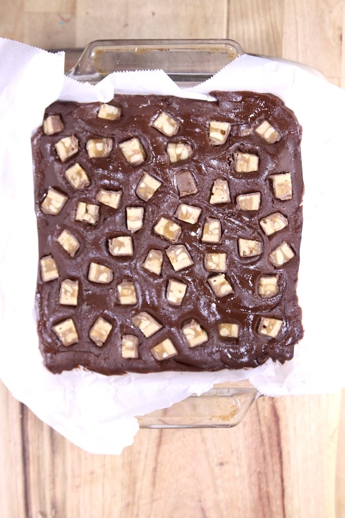 Chocolate fudge topped with chopped mini Snickers bars