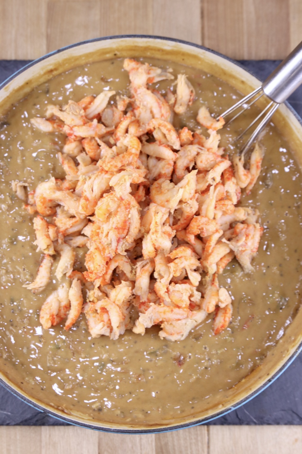 Crawfish Pie filling topped with crawfish tails