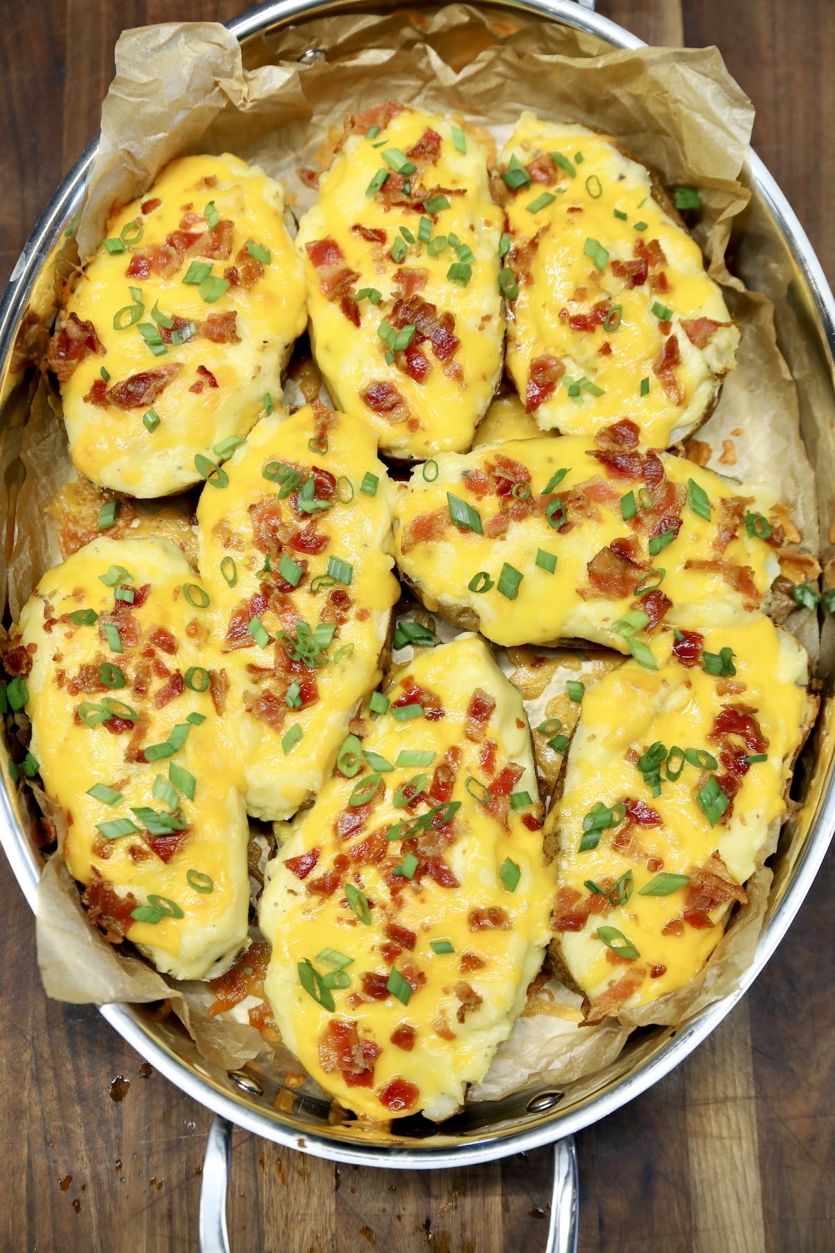 Oval casserole with twice baked potatoes.